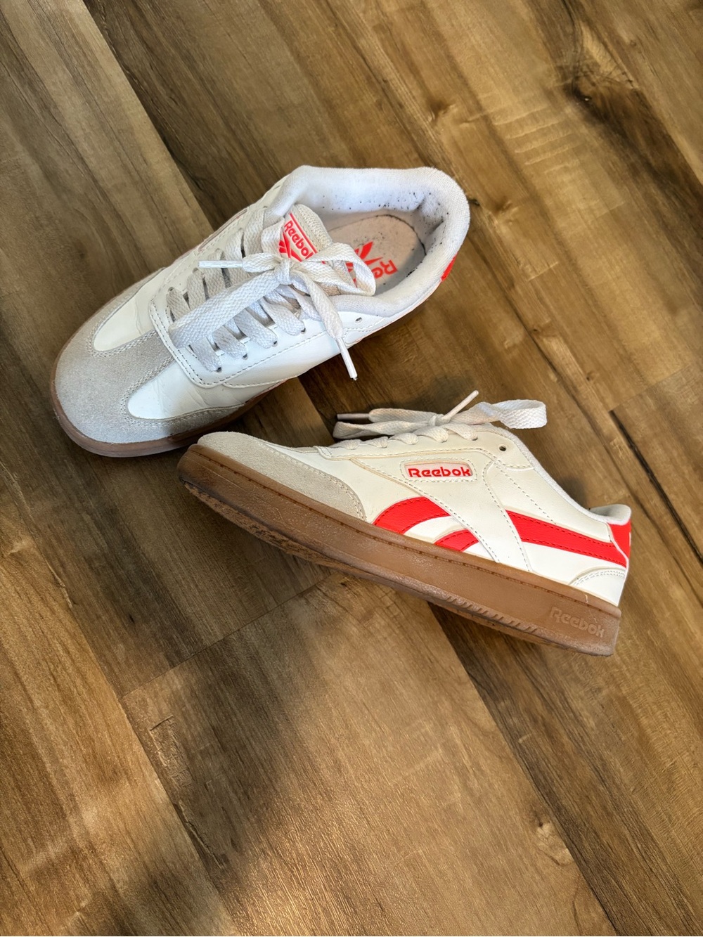 Kids Reebok White Sneakers with Red/Orange Accents